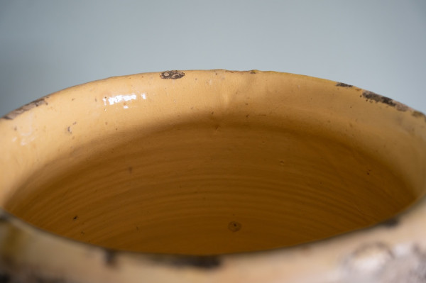 yellow glazed French antique vase called a Biot
