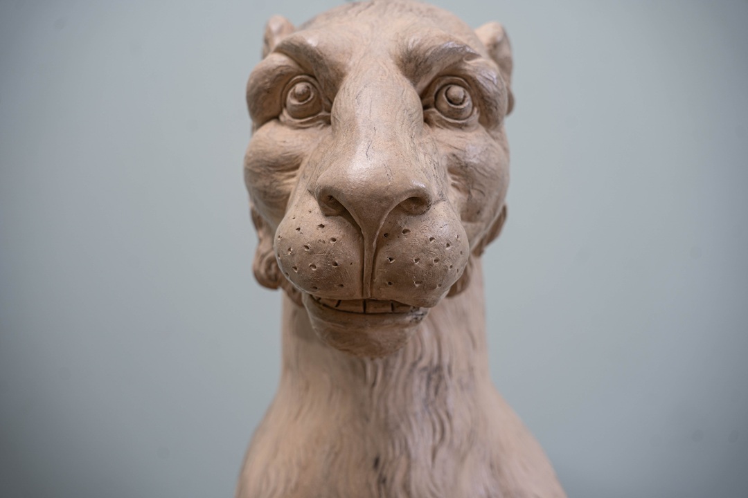 a Coade stone statue of a tiger or lion