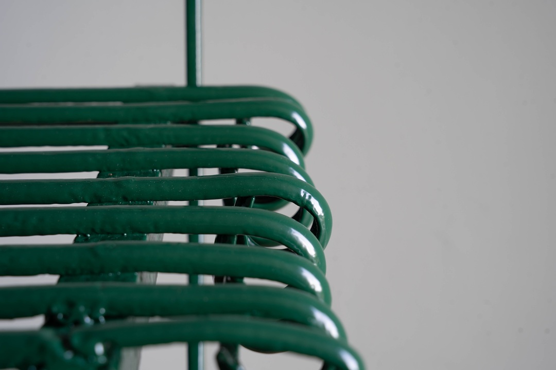 a restored antique wrought iron garden bench from Arras France