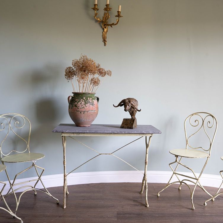 a garden dining table and chair set that folds