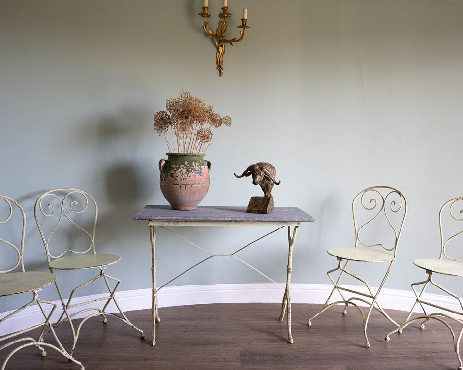 a garden dining table and chair set that folds