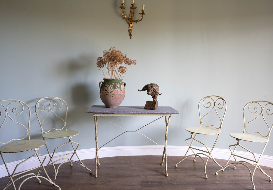 a garden dining table and chair set that folds