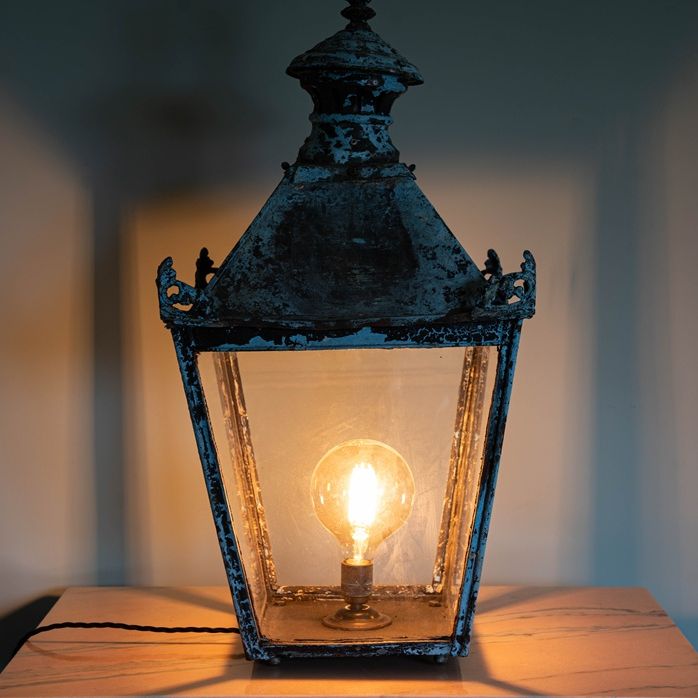 an antique copper light