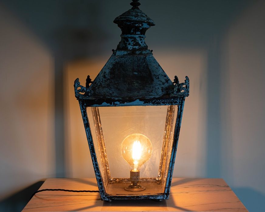 an antique copper light