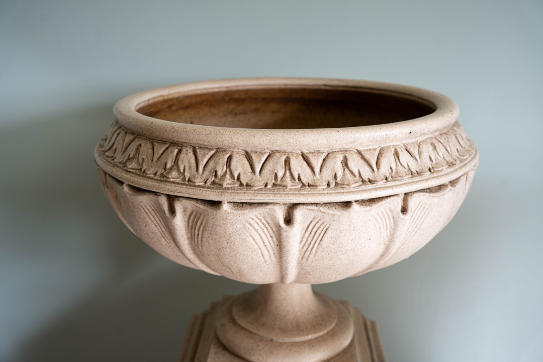 a LEFCO terracotta antique garden urn with plinth