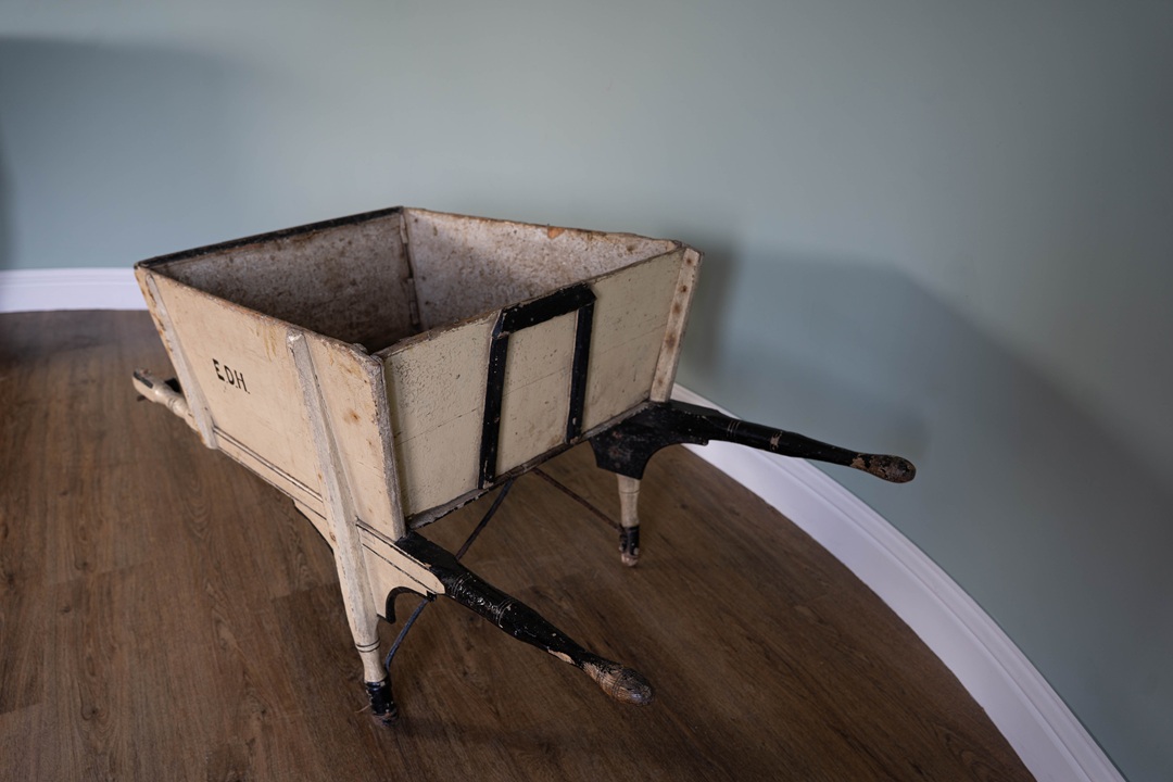antique wooden wheelbarrow