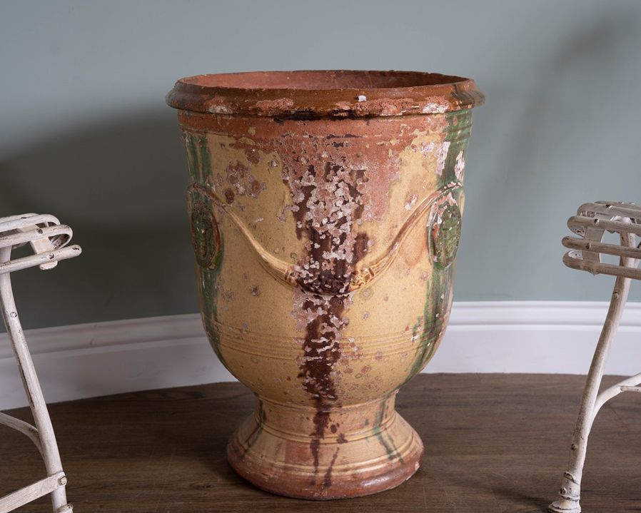 interior decor a large glazed yellow green and brown pot from France in Anduze