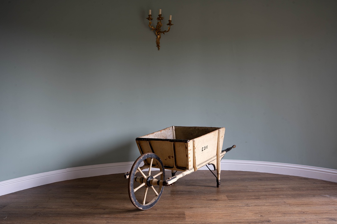 working antique wooden wheelbarrow