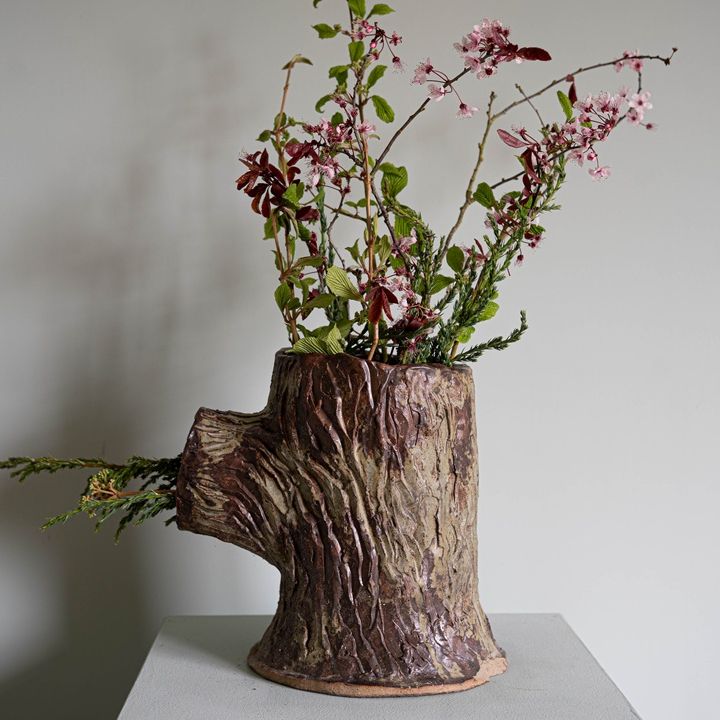 a small antique garden strawberry planter