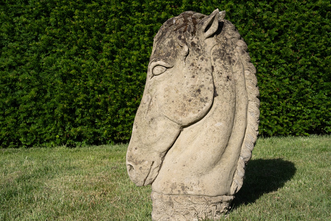 a decorative garden horses head sculpture