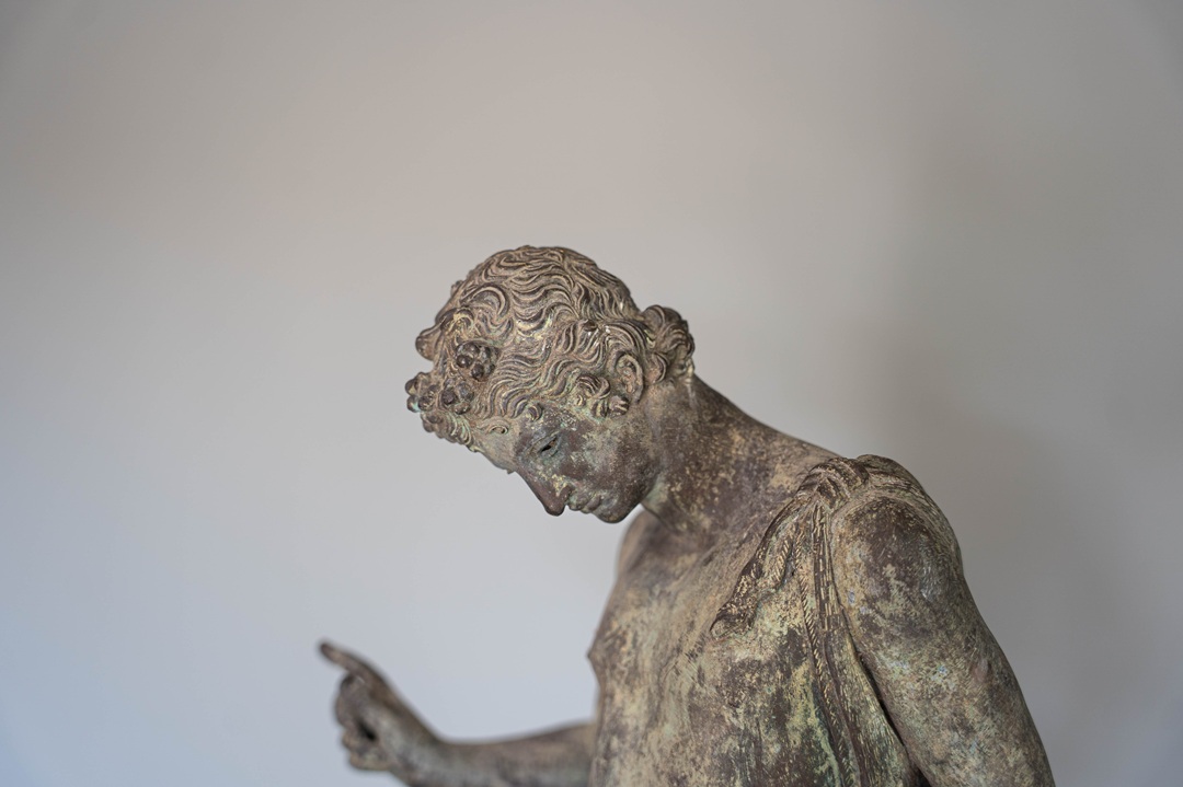 antique garden bronze sculpture of Narcissus