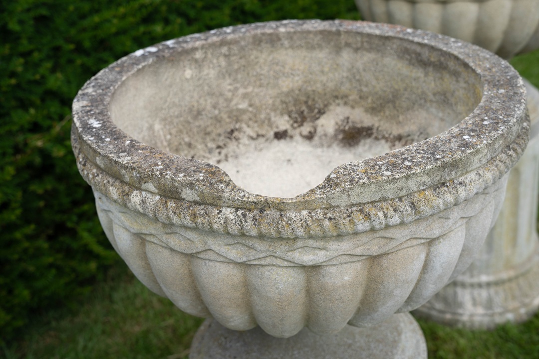 set of vintage garden urns with matching plinths