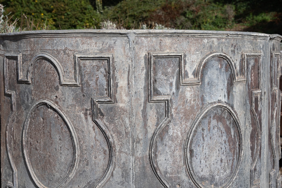 a classic design antique lead cistern for use as a fountain