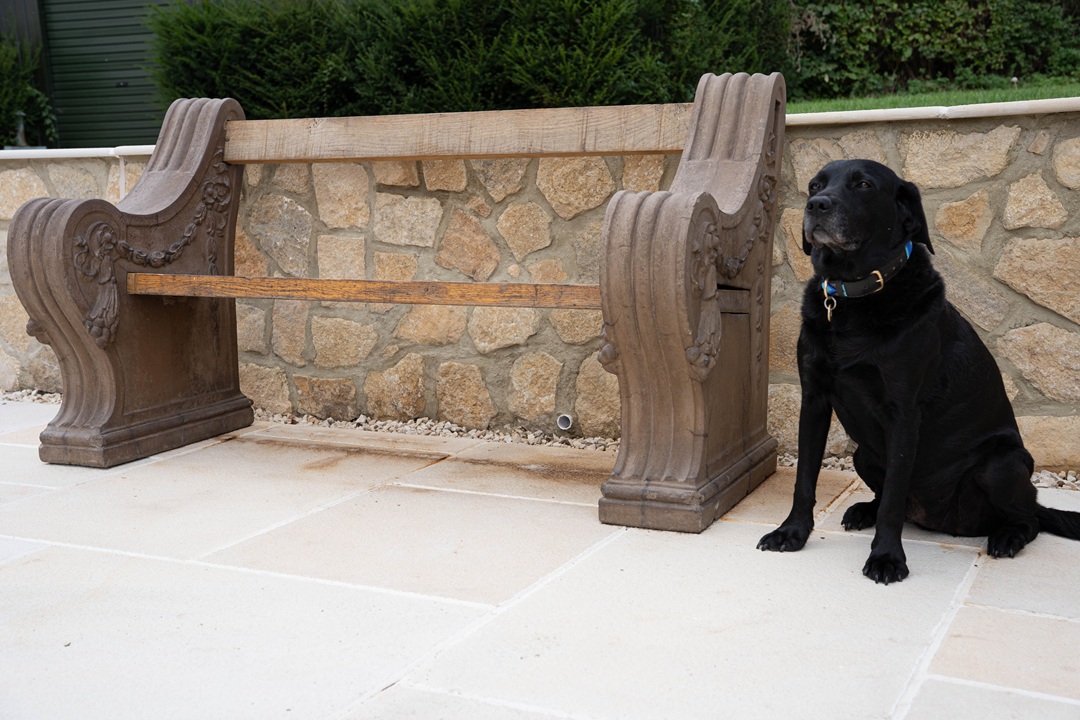 a decorative antique garden bench