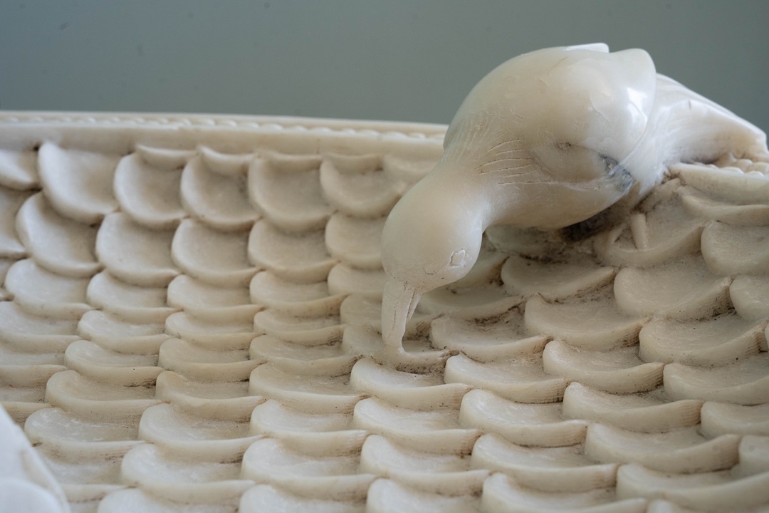a marble antique garden bird bath
