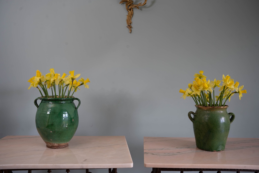 an antique French glazed terracotta confit pot