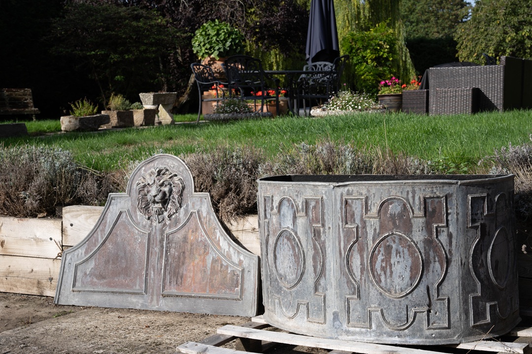 an antique lead garden fountain