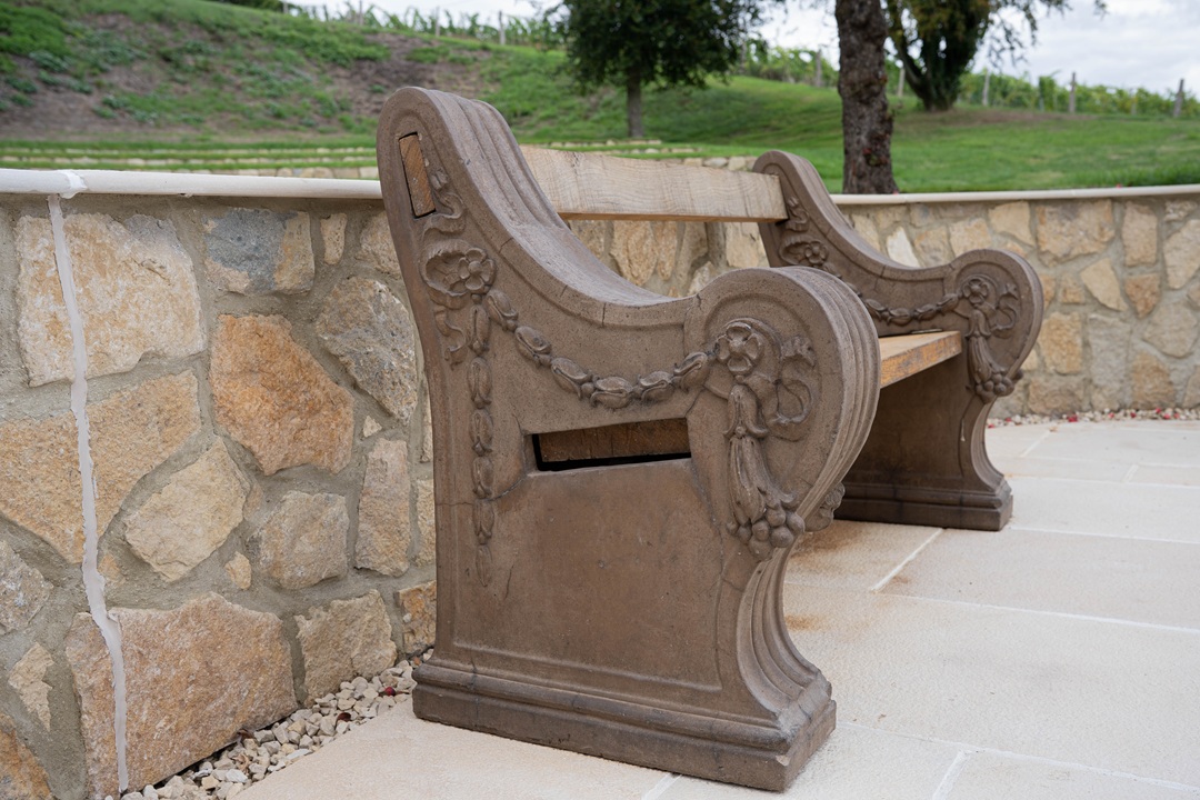 an ornate antique Doulton garden bench